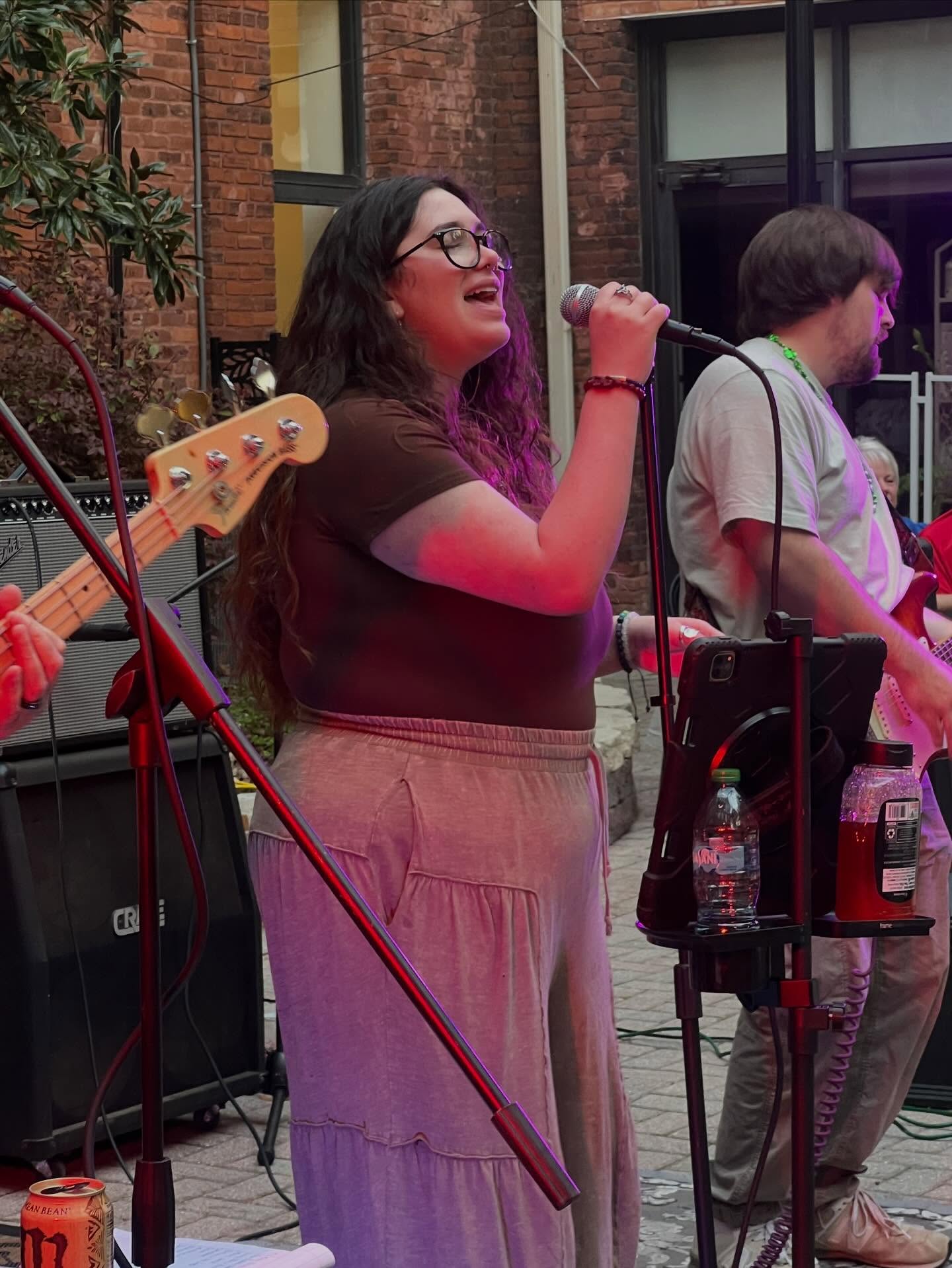 Lead singer performing live with the band